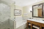 Beautiful bath and large custom marble shower